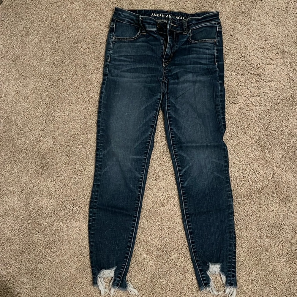 American Eagle size 4 skinny stretch jeans w ragged hem